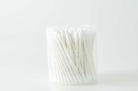 Close up of white cotton buds on white backgroundの写真素材