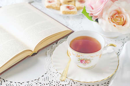 Close up of cup of tea on table with vintage toneの写真素材
