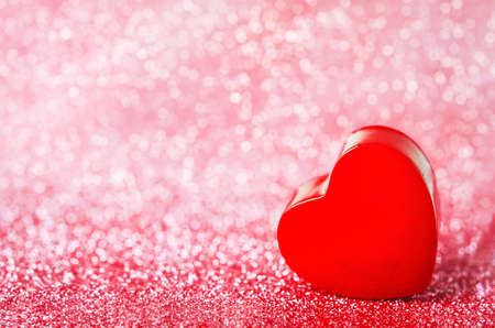 Close up of couple red heart on red bokehの写真素材