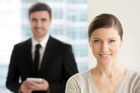 Confident professional business lady smiling for camera, internet online digital marketing team...
