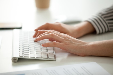 Businesswoman working on computer concept, female hands typing text on keyboard, woman using desktop...