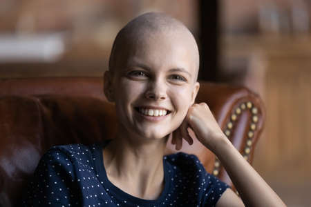 The greatest victory. Portrait of excited young female being in complete remission after successful...