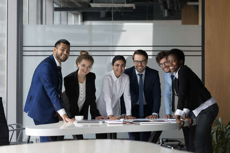 Company professional successful staff members portrait concept. Six multi ethnic young, ambitious...