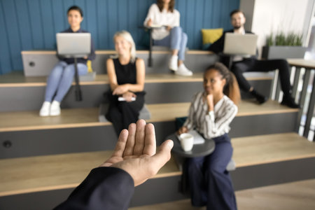 Hand of business speaker man talking to diverse audience, presenting speech, project. Company...