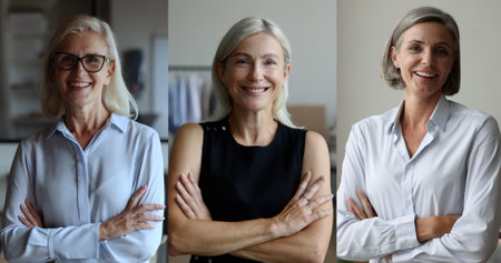 Vertical portraits three blonde middle-aged beautiful businesswomen stand with arms crossed posing...