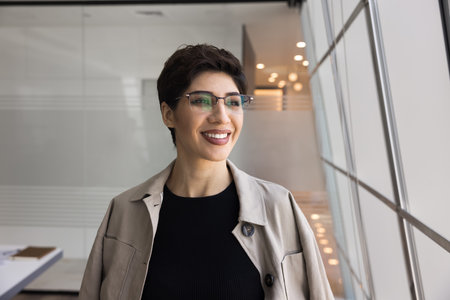 Charismatic professional. Head shot portrait beautiful mature business lady teacher trainer coach in...