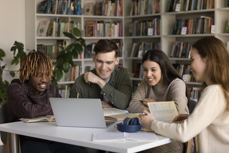 Blended education and peer learning. Multiethnic diverse gen z students pupils use notebook in...