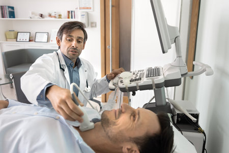 Ultrasound examination. Confident doctor sonologist gp sit by monitor move scanner sensor across neck of male patient lying on couch check thyroid gland examine lymph nodes during ultrasonic researchの写真素材