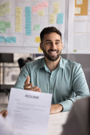 Self introduction. Confident smiling young male job seeker speak on interview with human resource...