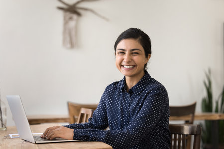 Successful on distance. Workplace portrait joyful young woman remote learning student professional...