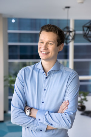 Professional confidence. Ambitious young male business leader manager entrepreneur student stand...