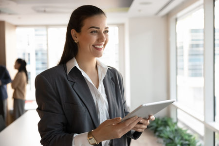 Looking forward specialist. Portrait smiling young woman business owner lawyer secretary manager...