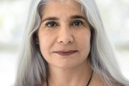 Serious attractive mature woman, close up portrait. Middle-aged female with attractive appearance,...