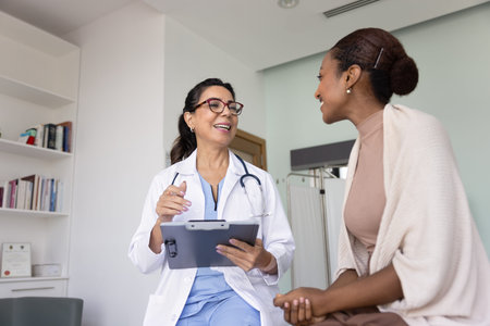 Doctor giving a consultation to a patient in a bright clinic