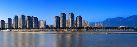 Cityscape, Riverside Riverside, rivers rivers, modern buildings, residential buildings, blue sky, undulating hills, beautiful panoramic picture.の写真素材