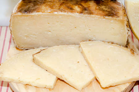 Tasty ripened cheese and cut portions