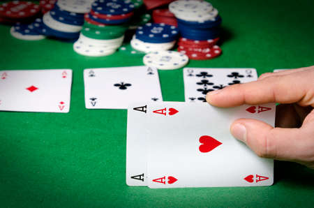 Closeup of poker player with two acesのeditorial素材