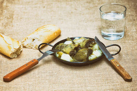 Stew of artichokes with potatoesの写真素材