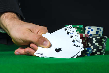 Royal Flush in poker and betting chips
