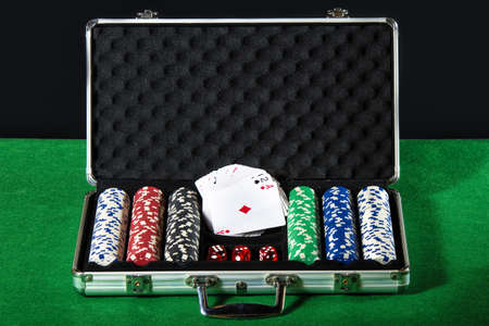 Briefcase poker with cards and dice bettingの写真素材