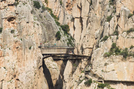 ARDALES (MALAGA), SPAIN - APRIL 17: Tourists walk along the 'El Caminito del Rey' (King's Little Path), World's Most Dangerous Footpath reopened in May 2015 a safer footpath was installed above the original. On apr 17, 2015 in Ardales (Malaga, Spain).のeditorial素材