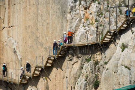 ARDALES (MALAGA), SPAIN - APRIL 17: Tourists walk along the 'El Caminito del Rey' (King's Little Path), World's Most Dangerous Footpath reopened in May 2015 a safer footpath was installed above the original. On apr 17, 2015 in Ardales (Malaga, Spain).のeditorial素材