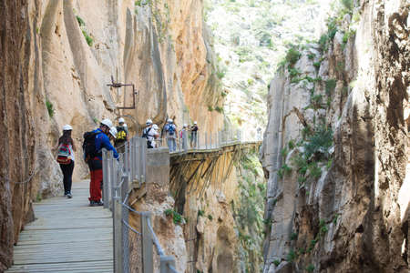 ARDALES (MALAGA), SPAIN - APRIL 17: Tourists walk along the 'El Caminito del Rey' (King's Little Path), World's Most Dangerous Footpath reopened in May 2015 a safer footpath was installed above the original. On apr 17, 2015 in Ardales (Malaga, Spain).のeditorial素材