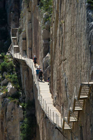 ARDALES (MALAGA), SPAIN - APRIL 17: Tourists walk along the 'El Caminito del Rey' (King's Little Path), World's Most Dangerous Footpath reopened in May 2015 a safer footpath was installed above the original. On apr 17, 2015 in Ardales (Malaga, Spain).のeditorial素材