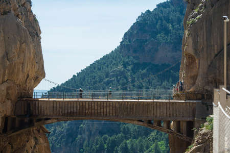 ARDALES (MALAGA), SPAIN - APRIL 17: Tourists walk along the 'El Caminito del Rey' (King's Little Path), World's Most Dangerous Footpath reopened in May 2015 a safer footpath was installed above the original. On apr 17, 2015 in Ardales (Malaga, Spain).のeditorial素材