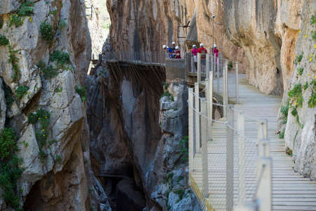 ARDALES (MALAGA), SPAIN - APRIL 17: Tourists walk along the 'El Caminito del Rey' (King's Little Path), World's Most Dangerous Footpath reopened in May 2015 a safer footpath was installed above the original. On apr 17, 2015 in Ardales (Malaga, Spain).のeditorial素材