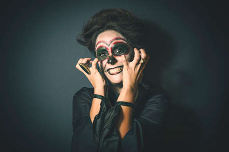 Portrait of woman in disguise for Halloweenの写真素材