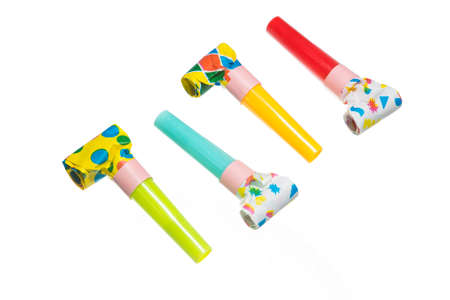 Party blowers on white background