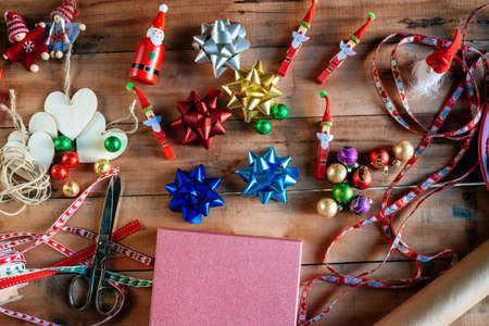 Various Christmas decorations on wooden backgroundの写真素材