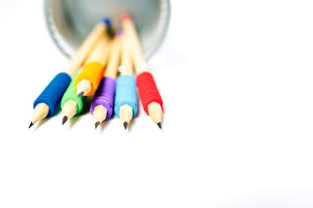 Color pencils in pen on white backgroundの写真素材