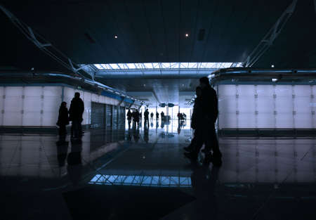 passengers walking by the airportの写真素材