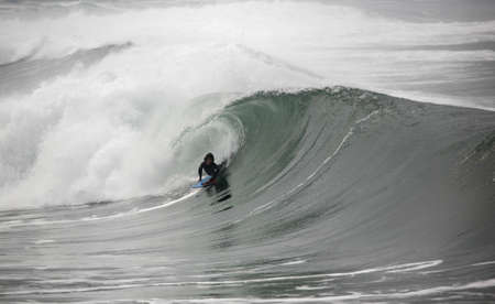 bodyboarder in the tunnelの写真素材