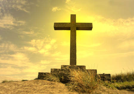 cross silhouette on top of the mountain の写真素材