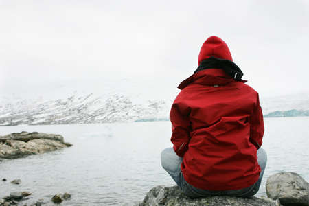 girl in meditation at Jostedalsbreen glacierの写真素材