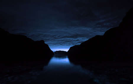 mirrored fjord view in norwayの写真素材