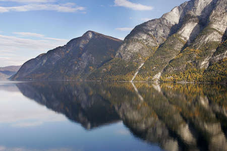 mirrored fjord view in norwayの写真素材