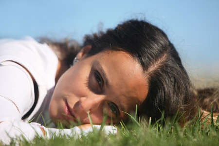 sweet woman rest on the grass