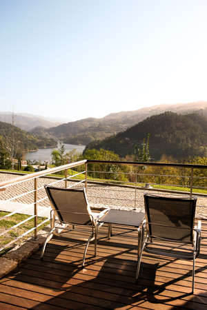Beautiful outdoor space with a table and chairsの写真素材