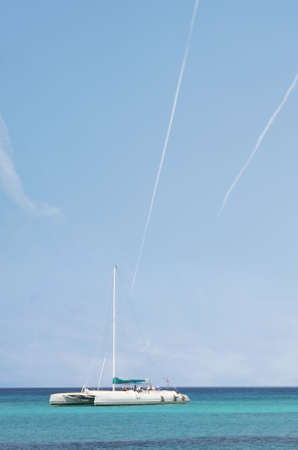 Catamaran in caribbean sea on blue sky backgroundの写真素材