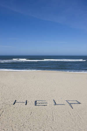 help message in the beachの写真素材