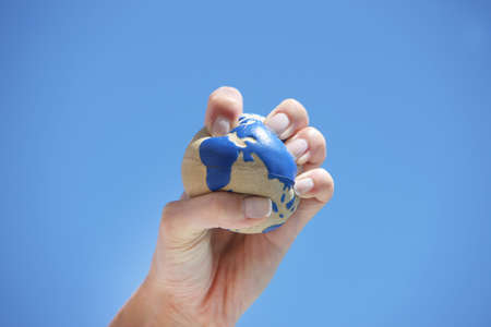 hand holding the world globeの写真素材