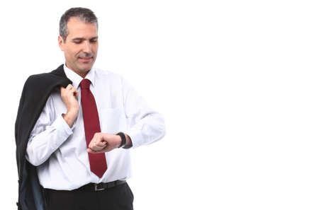 handsome businessman checking time on his watchの写真素材