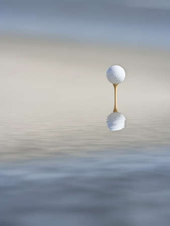 photo of a golf ball and teeの写真素材