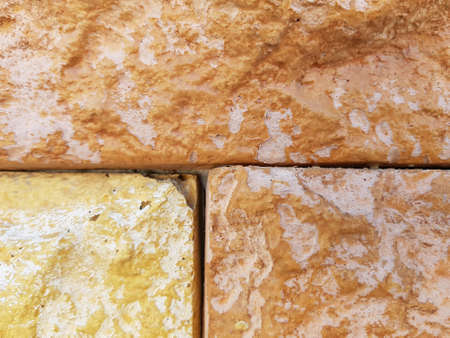 Bricks in brown colors, textured background