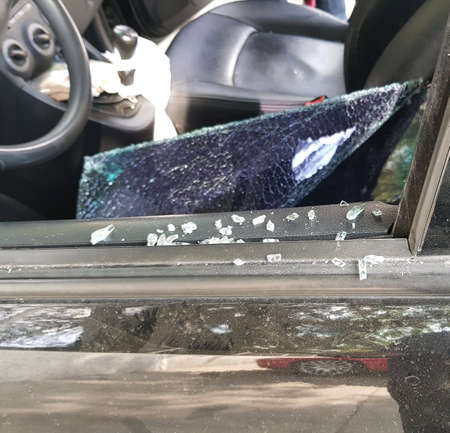 Broken glass in parked vehicle, problem of insecurity