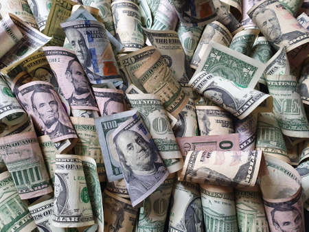 american dollar banknotes of different denominations unorganizedの写真素材
